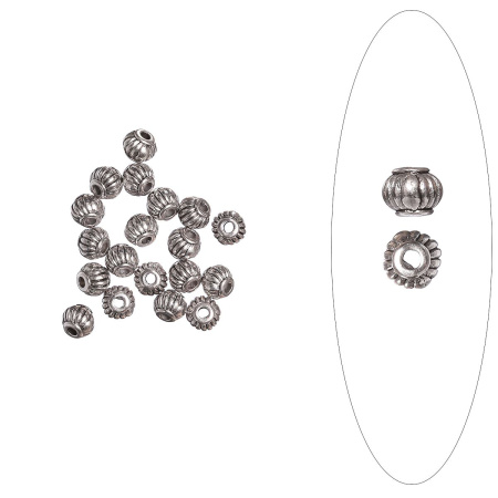 <p>
 Бусина в форме фонарика с бороздками. Изготовлена из бижутерного сплава с серебристым покрытием. Оттенок может отличаться от фотографии. Размер отверстия: 1,5 мм. Цена за 5 грамм (примерно 18 штук).
</p>