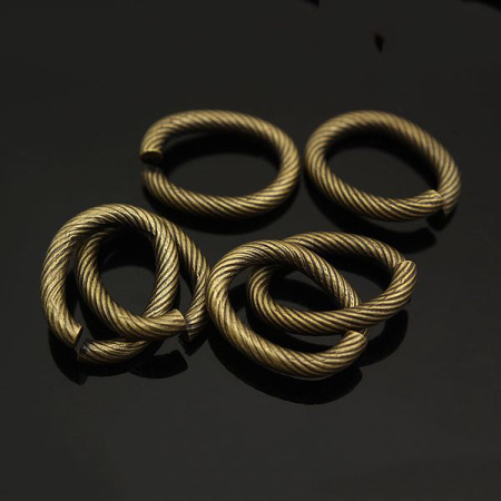 Соединительное колечко, 14х10.5мм (толщина 2.0мм, внутренний размер 10х6.5мм), овальное, витое, Корея, базовый материал - сталь, бронзовое с чернением, 1 шт. Соединительное колечко, 14х10.5мм (толщина 2.0мм, внутренний размер 10х6.5мм), овальное, витое, Корея, базовый материал - сталь, бронзовое с чернением, 1 шт.