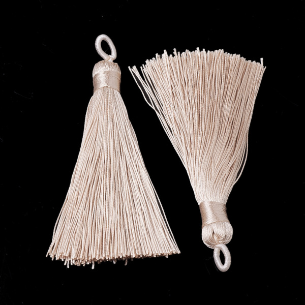 Кисточка декоративная, 75-85х9мм, полиэстер, розово-бежевая, 2 шт. <p>Изящная полиэстеровая кисточка с петелькой. Используется для создания сережек, кулонов (сотуаров), подвесок на сумки, четки и брелоки. Оттенок может отличаться от фотографии. Размер может немного отличаться от заявленного. Цена за 2 шт.</p>