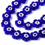 <p>Стеклянные бусины - цветочки ручной работы, выполнены в технике миллефиори (миллефьори). Бусины насыщенного синего цвета с бело-чёрной серединкой, напоминающей глаз. Иногда предметы с такими глазками используют как амулет от сглаза. Оттенок может отличаться от фотографии и от партии к партии. Бусины могут существенно отличаться по форме и размеру. В низке около 18 бусин, низки формируются без проверки каждой бусины на дефекты. Цена за низку.
</p>