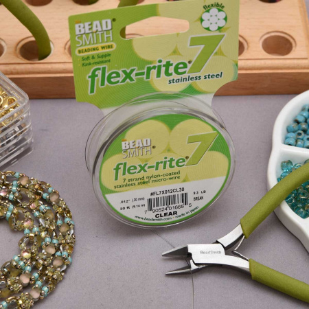 <p>Ювелирный тросик Flex-Rite с нейлоновым покрытием. 7-жильный тросик. Цвет стальной (темно-серебристый). Оттенок может отличаться от фотографии. Цена за катушку 30 футов (9.1 метра).</p>