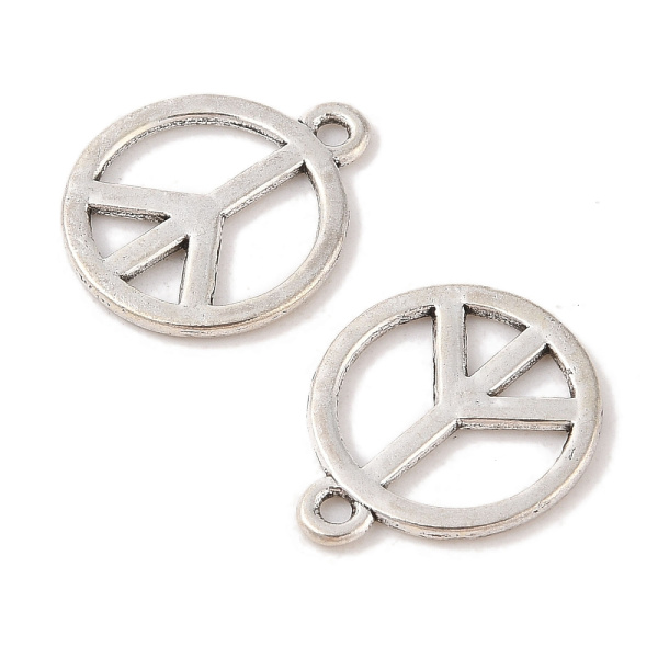 <p>Двусторонняя подвеска из тибетского серебра в форме пацифистского знака (peace symbol). На фотографии показана лицевая и тыльная стороны. На подвесках данной партии возможны небольшие неровности на покрытии, пятнышки. Базовый материал - бижутерный металлический сплав, покрытие серебристое с чернением. Оттенок может отличаться от фотографии и в разных поставках. Цена за 10 шт.</p>
