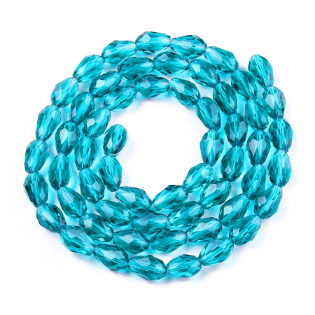 <p>Стеклянная граненая бусина - капелька, размер 8*12 мм. Цвет голубой, оттенок может отличаться от фотографии и в разных поставках. Низки формируются без проверки каждой бусины на дефекты. Цена за низку, около 55 бусин.</p>