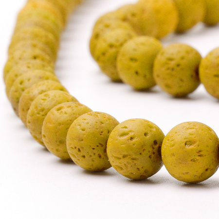 <p>Бусины из натуральной вулканической лавы (вулканического туфа), тонированной в желтый цвет. Оттенок может отличаться от фотографии. Бусины матовые. Могут немного отличаться по форме и размеру. Цена за низку, около 47 бусин. Бусины могут быть покрыты пылью от сверления, рекомендуется их протереть или промыть их перед использованием.</p>