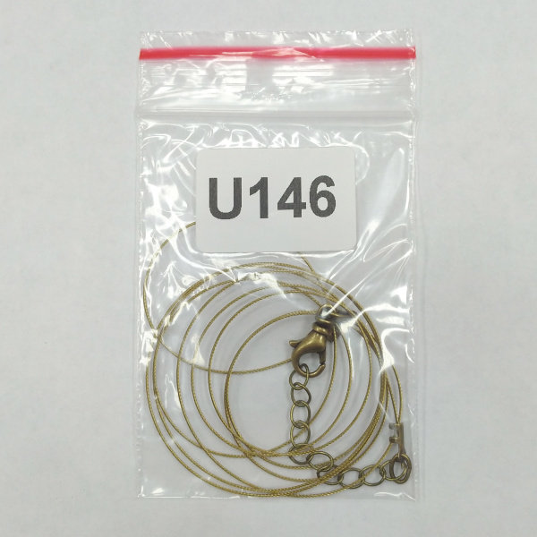 Набор для бус (колье, браслета), тросик с концевиками, карабином и удлинителем, базовый материал - сталь, цвет античное золото (светлая бронза), 1 метр + 7 см <p>Набор для сборки колье, бус или браслета длиной до 107 см. Цвет светлая бронза. В набор входит 7-жильный ювелирный тросик японского производства толщиной 0.48мм (сталь с нейлоновым покрытием) - около 1 метра, обжимные концевики с соединительными колечками (пара), застежка-карабин с вращающимся основанием 14*7мм и удлиняющая цепочка длиной 4 см. Вся фурнитура, кроме цепочки - оксидированная позолота, цепочка с бронзовым покрытием. Оттенок может отличаться от фотографии и в разных поставках. Цена за 1 набор.</p>