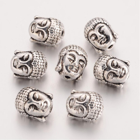 <p>
 Двусторонняя металлическая бусина - голова Будды. Стиль тибетское серебро. Оттенок может отличаться от фотографии и в разных поставках. Диаметр отверстия около 1.4 мм. Цена за 10 шт.
</p>