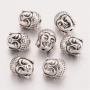 <p>
 Двусторонняя металлическая бусина - голова Будды. Стиль тибетское серебро. Оттенок может отличаться от фотографии и в разных поставках. Диаметр отверстия около 1.4 мм. Цена за 10 шт.
</p>