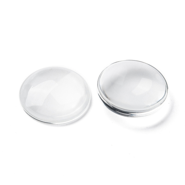 <p>
 Круглый стеклянный прозрачный кабошон, толщина 5-8 мм. Диаметр примерно 24,7 мм. Хорошо смотрится в рамке с подложенной под него картинкой или фотографией. На кабошонах возможны небольшие царапинки. Цена за упаковку 40-50 грамм в зависимости от толщины кабошонов (около 10 штук, фасуются без проверки на дефекты).
</p>