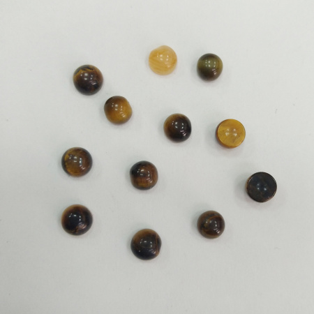 <p>
Миниатюрный каменный кабошон из натурального тигрового глаза. Оттенок может отличаться от фотографии. Размер и форма могут немного отличаться от заявленных. Кабошоны отличаются по цвету и рисунку, а также по толщине: при заказе нескольких штук мы постараемся подобрать похожие. Цена за 2 шт.
</p>