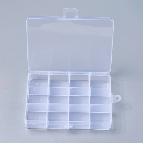 Коробочка для хранения, 13х10х22см, прямоугольная, 12 ячеек, прозрачная, защёлкивающаяся, 1 шт. <p>Прямоугольный контейнер (пенал) для хранения фурнитуры из качественного прозрачного пластика с двумя защёлками. У органайзера имеется 12 ячеек с внутренним размером примерно 3*3 см. На торцевой части контейнера имеется петелька для подвешивания. На коробочке возможны небольшие царапинки, пятнышки. Цена за 1 шт.</p>