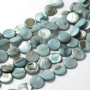 <p>Круглые бусины-пластинки из натурального тонированного перламутра приглушённого зеленовато-сине-голубого цвета. На бусинах есть темные пятна, возможны щербинки естественного происхождения. Бусины могут немного отличаться по форме и размеру. Оттенок может отличаться от фотографии и от партии к партии. Цена за 1 низку длиной около 36 см (примерно 25 бусин, низки формируются без проверки каждой бусины на дефекты).</p>