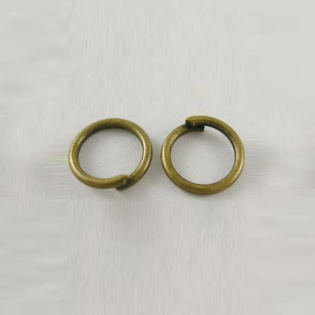 Соединительное колечко, 7мм (толщина 1.0мм, внутренний размер 5мм), базовый материал - латунь, бронза, 10 грамм