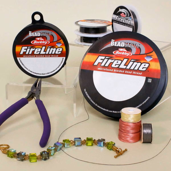 <p>
Вощеная плетеная леска FireLine braided bead thread отлично подходит для плетения, в том числе для тяжелых, массивных украшений. Толщина около 0,15 мм (0,006 дюйма). Нить очень прочная, выдерживает вес до 2,7 кг (6 LB). Цвет Crystal (белая). Намотка может состоять из нескольких частей. Цена за катушку 50 ярдов (около 45 метров).
</p>