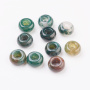 <p>Бусины - рондели с крупным отверстием (абакусы, диски) из натурального камня - индийского агата. Диаметр отверстия около 6 мм. Эти бусины отлично подходят для браслетов в стиле Пандора, а также для сборки украшений с кожаными шнурами. Бусины могут немного отличаться по форме и размеру. Оттенок может существенно отличаться от фотографии: преобладают бусины в зеленых тонах, также попадаются бусины других цветов (бордовые, сиреневые, коричневые, серые и т.д.). Цена за 1 бусину.</p>