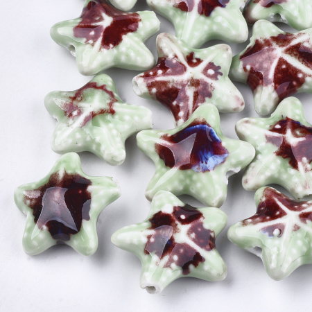 <p>Крупная эффектная керамическая бусина - морская звездочка ручной работы. Бусина покрыта глазурью светло-зеленого цвета с сине-голубыми и бордовыми узорами. Цвет может отличаться от фотографии. Бусины могут отличаться по форме и размеру, рисунок на каждой бусине уникален. Диаметр отверстия - около 2.5 мм. Цена за 1 бусину.</p><p>ВНИМАНИЕ: отверстие сделано не очень аккуратно, возможны небольшие сколы у отверстия.</p>
<p>УЦЕНКА: небольшие сколы у отверстий, мелкие пятна, неровности на бусине и у отверстий.</p>