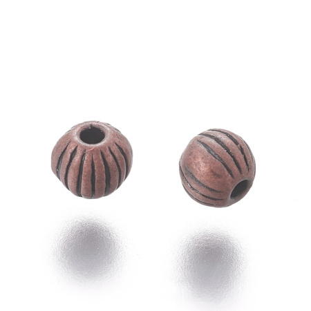 <p>Бусина - разделитель шарик с полосками, под античную медь. Оттенок может отличаться от фотографии. Диаметр отверстия около 1 мм. Цена за упаковку 10 грамм (около 65 бусин).</p>