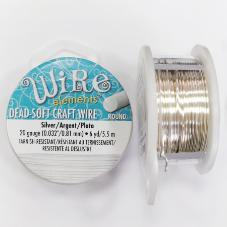 Проволока гибкая, 0.812мм, Wire elements (Craft Wire), не темнеющая, серебристого цвета, катушка, 5.5 метров <p>Качественная не темнеющая серебристая проволока для создания украшений и других видов рукоделия. Марка Wire elements (ребрендинг марки Craft Wire pro-quality). Цвет светло-серебристый, устойчивый к потемнению (Silver tarnish-resistant). Оттенок может отличаться от фотографии и в разных поставках. Базовый материал - медь. Толщина 20 gauge (около 0.812 мм). Намотка может состоять из нескольких частей. Цена за катушку 6 ярдов (около 5.49 метра). Произведена в Пакистане для американской компании Bead Smith.</p>