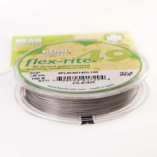 <p>
Профессиональный ювелирный тросик Flex-Rite с нейлоновым покрытием. 49-жильный тросик премиум-класса. Цвет стальной (темно-серебристый). Оттенок может отличаться от фотографии и в разных поставках. На фотографии изображена катушка, с которой мы отрезаем тросик. Тросик в заказ вкладывается без катушки! Цена за отрезок 50 см. При заказе нескольких единиц отрезается цельным куском.
</p>
