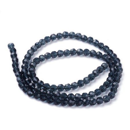 <p>Бюджетные бусины из стекла с довольно крупными гранями. Цвет очень тёмный серо-синий (деним). Оттенок может отличаться от фотографии и в разных поставках. Бусины могут немного отличаться по форме и размеру. Цена за 1 низку, около 90 бусин (низки формируются без проверки каждой бусины на дефекты).</p>