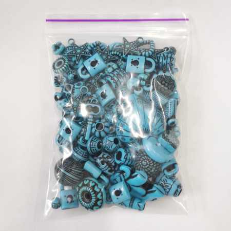 <p>
Набор акриловых бусин и подвесок, микс случайных форм и цветов в сине-голубых тонах. Элементы в наборе могут отличаться от представленных на фотографии. Цена за набор 50 грамм (около 65-130 бусин/подвесок в зависимости от размера, фасуются без проверки на дефекты и без подбора по форме, цвету, размеру).
</p>