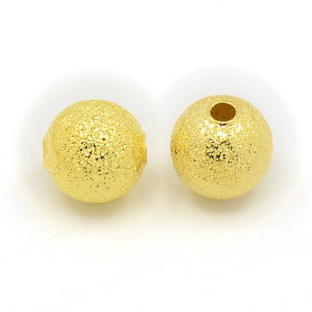 <p>
Латунная бусина с покрытием звездная пыль (stardust) золотистого цвета. Также такие бусины называют "сахарный шарик" или "бусина с сахарным покрытием". Диаметр отверстия около 1.5 мм. Оттенок может отличаться от фотографии и в разных поставках. На бусинах возможны пятнышки, неровности. Цена за 5 грамм (примерно 13 штук), бусины фасуются без проверки на дефекты.
</p>