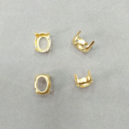 <p>На оправах возможны пятнышки. Пришивная оправа с цапами для кристалла. Форма овал, размер 10*8 мм. Цапы подходят для кристаллов Swarovski. Базовый материал - латунь, покрытие золотого цвета. Оттенок может отличаться от фотографии и от партии к партии. Цена за 20 шт.</p><p>ВНИМАНИЕ: задняя сторона может быть немного разной в разных поставках (см. фото).</p>