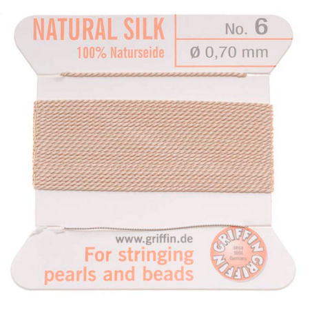 <p>Прочная нить из высококачественного натурального 100% шелка, произведена компанией Griffin (Германия). К нити прикреплена проволочная иголочка. Идеально подходит для использования с жемчугом и натуральными камнями. Толщина около 0,7 мм. Оттенок может отличаться от фотографии и в разных поставках. Цена за моток 2 метра.</p>