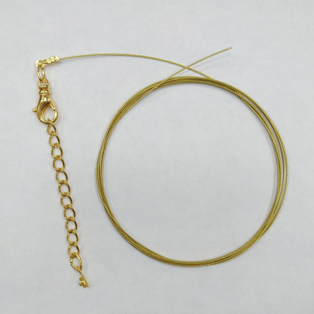 Набор для бус (колье, браслета), тросик цвета античное золото с позолоченными концевиками, карабином и удлинителем, базовый материал - сталь, 1 метр + 7 см Набор для бус (колье, браслета), тросик цвета античное золото с позолоченными концевиками, карабином и удлинителем, базовый материал - сталь, 1 метр + 7 см