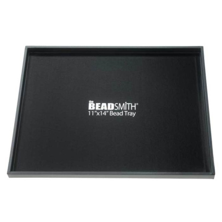 <p>Качественная подставка (лоток, поддон) BeadSmith Bead Tray для использования с ковриками для бисероплетения и сборки украшений. Легкий, но жесткий лоток с высокими бортиками позволит легко перемещать коврик в процессе работы, также с такой подставкой коврик можно использовать не только на столе, но и на коленях. В вес товара включен вес упаковки. Доставка почтой по предоплате. Цена за 1 поддон.</p>