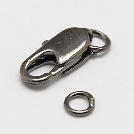 Застежка, 14х7мм, карабин продолговатый с соединительными колечками, базовый материал - латунь, вороненая сталь, 1 шт. Застежка, 14х7мм, карабин продолговатый с соединительными колечками, базовый материал - латунь, вороненая сталь, 1 шт.