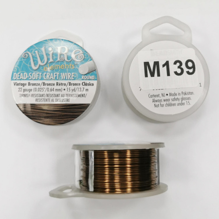 Проволока гибкая, 0.644мм, Wire elements (Craft Wire), не темнеющая, античная бронза, катушка, 13.7 метра <p>Качественная не темнеющая бронзовая проволока для создания украшений и других видов рукоделия. Марка Wire elements (ребрендинг марки Craft Wire pro-quality), цвет винтажная бронза, устойчивая к потемнению (VINTAGE BRONZE tarnish-resistant). Оттенок может отличаться от фотографии. Базовый материал - медь. Толщина 22 gauge (около 0,644 мм). Произведена в Пакистане для американской компании Bead Smith. Намотка может состоять из нескольких частей. Цена за катушку 15 ярдов (около 13.7 метров).</p>