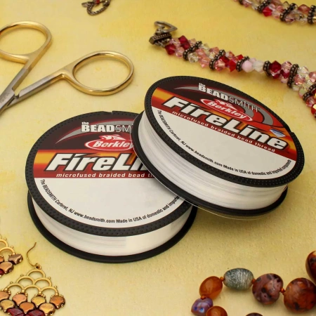 <p>
Вощеная плетеная леска FireLine braided bead thread отлично подходит для плетения, в том числе для тяжелых, массивных украшений. Толщина около 0,15 мм (0,006 дюйма). Нить очень прочная, выдерживает вес до 2,7 кг (6 LB). Цвет Crystal (белая). Намотка может состоять из нескольких частей. Цена за катушку 50 ярдов (около 45 метров).
</p>