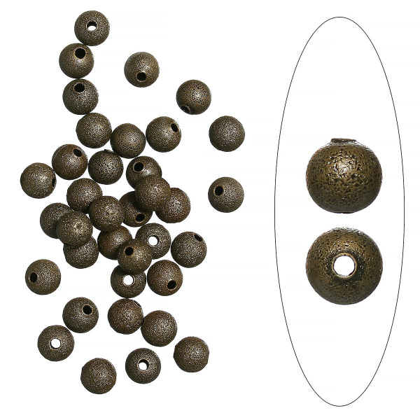 Бусина металлическая, 6мм, соляной шарик, базовый материал - латунь, бронзовый, 5 грамм <p>
Латунная бусина с бронзовым покрытием, выполнена в стиле "соляной техники". У бусин с одной стороны заметен шов, преимущественно у отверстий. Оттенок может отличаться от фотографии. Диаметр отверстия - 1 мм. Цена за упаковку 5 грамм (около 25 бусин).
</p>