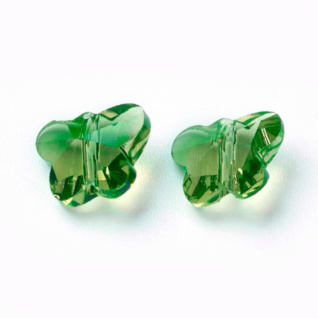 <p>Яркие, летние стеклянные бусины-бабочки зеленого цвета. Имитация бабочек Сваровски. Оттенок может отличаться от фотографии. На бусинах возможны небольшие царапинки. Цена за 5 шт.</p>